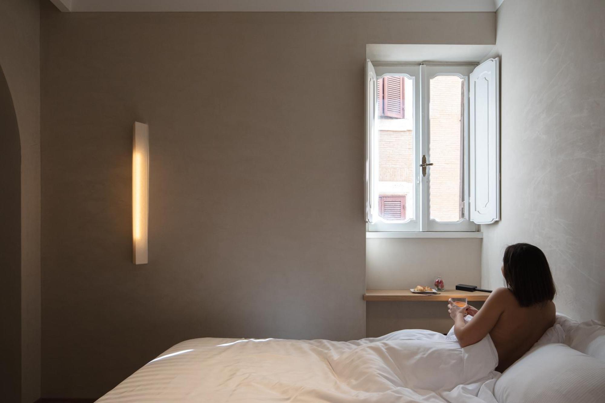 P10 Design Hotell Rom Exteriör bild